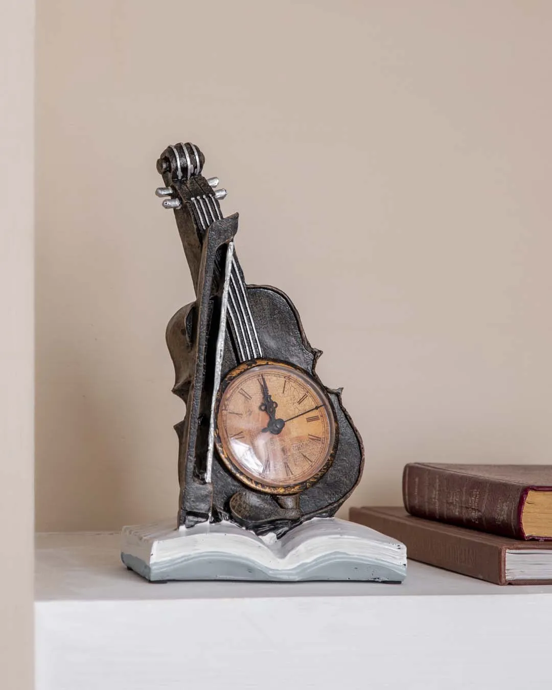 'Violin With Clock' Placed On Book Stand