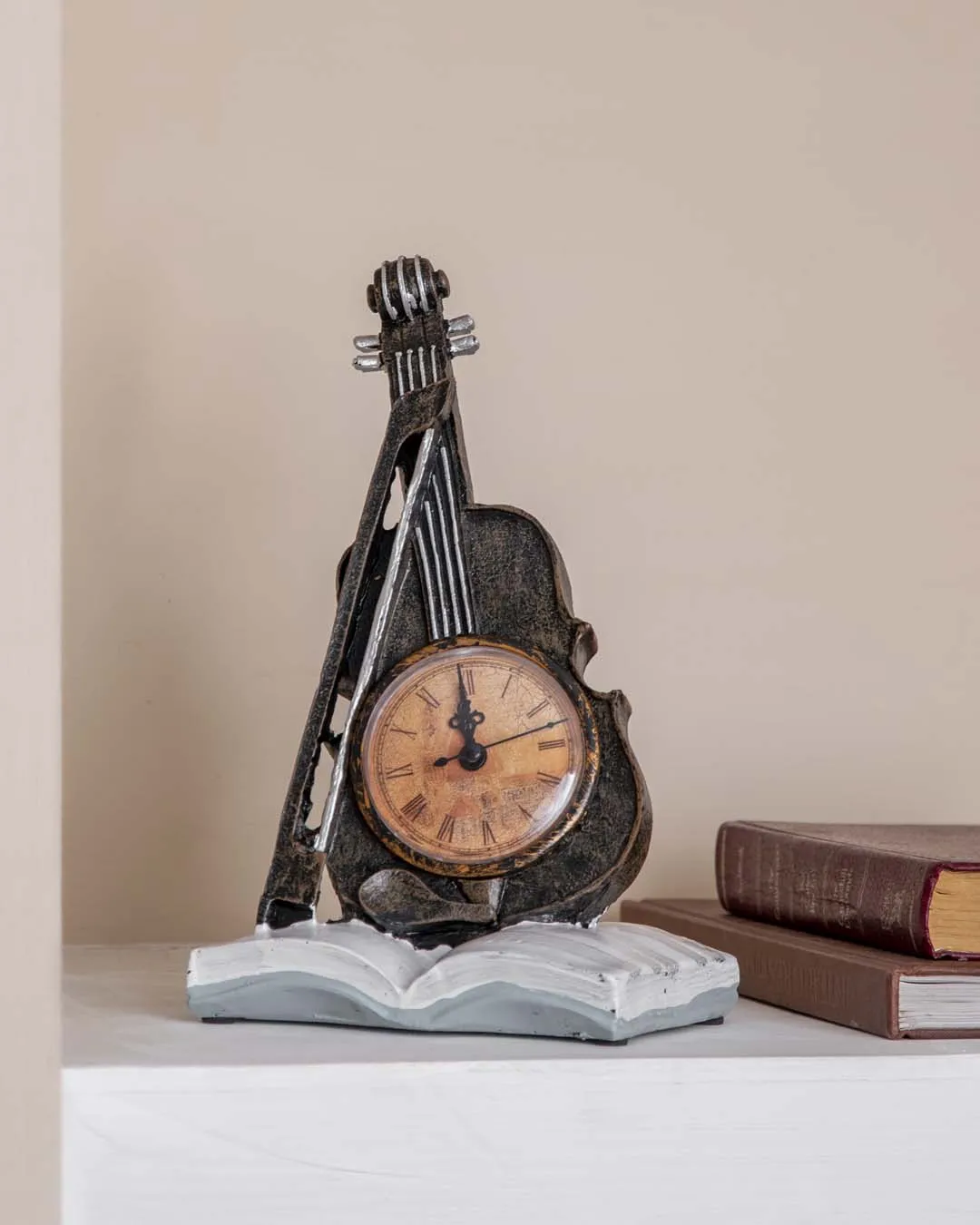 'Violin With Clock' Placed On Book Stand