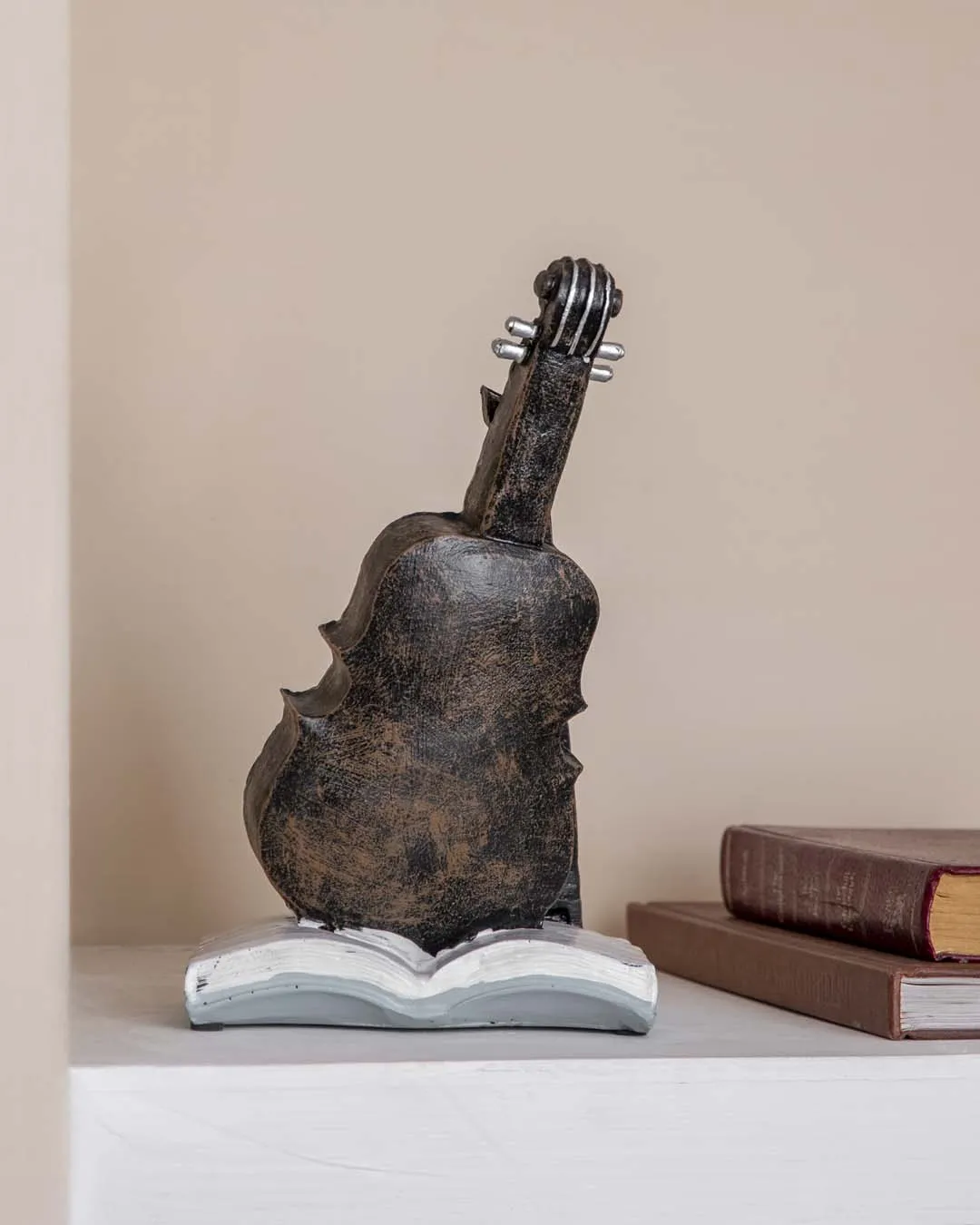'Violin With Clock' Placed On Book Stand